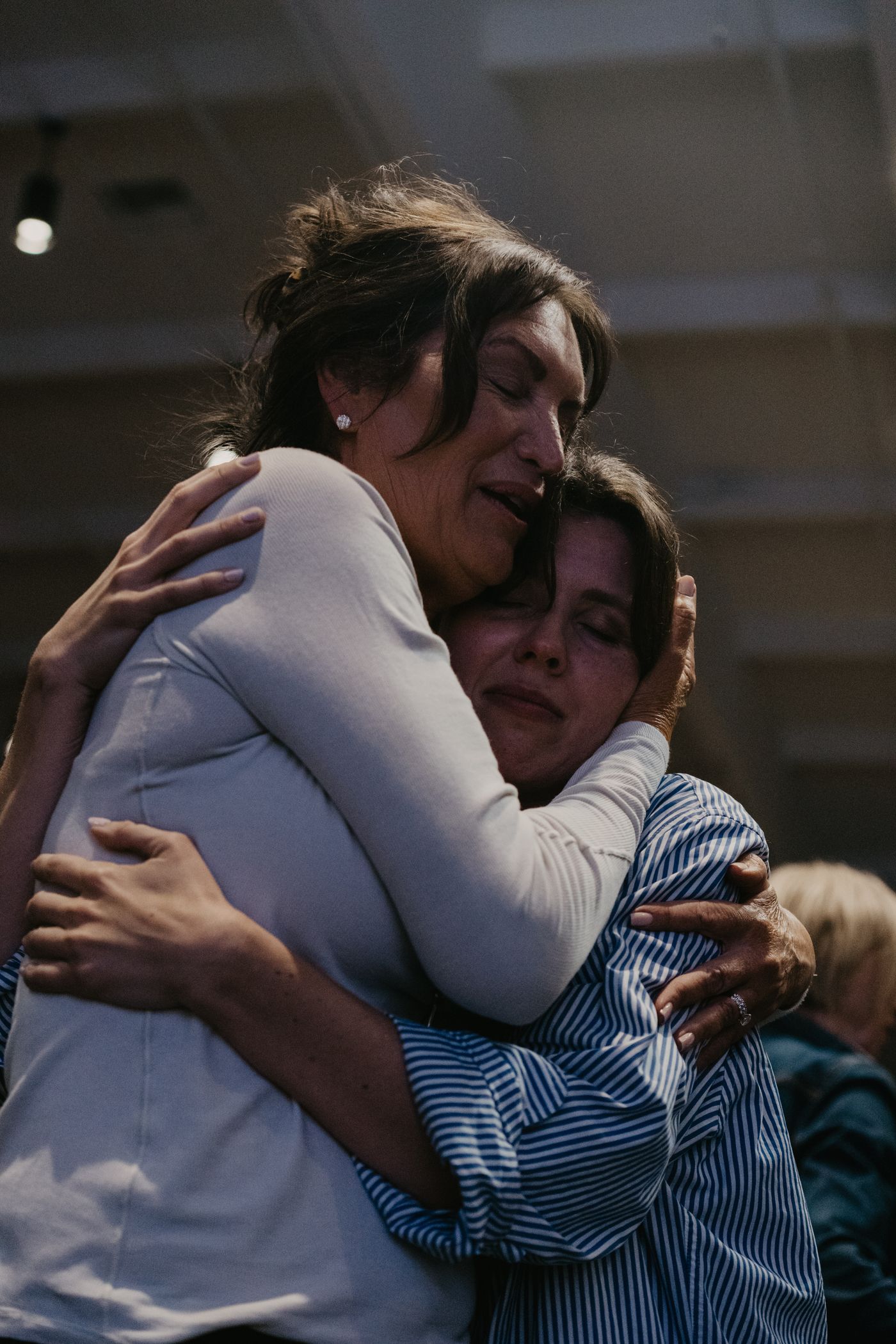 Two women in a long embrace